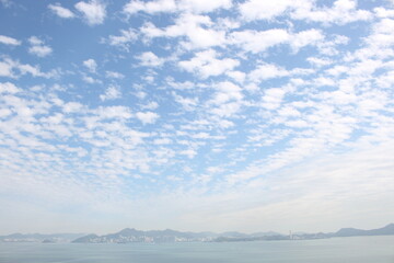 Beautiful fluffy clouds over the sea
