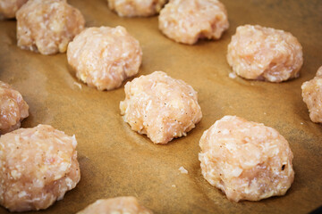 Raw chicken meatballs with cheese