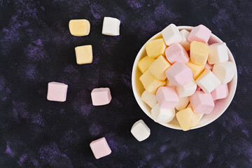 Marshmallow on dark background. Top view