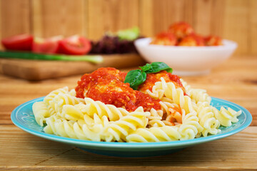 Meatballs on wooden background
