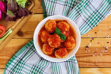 Meatballs on wooden background