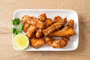 Fried Snapper Belly on white plate