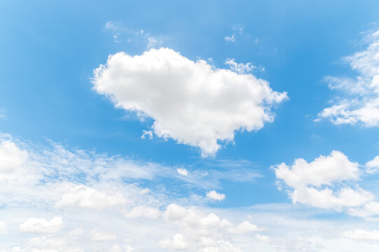White fluffy clouds in blue sky. © Jirawatfoto