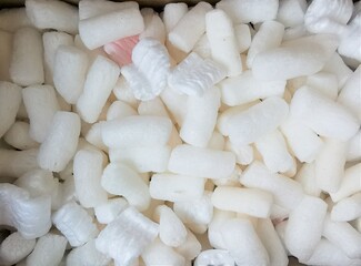 White foam, polystyrene, styropor. Blank packaging. Abstract background. Styrofoam close-up, great design for any purposes.