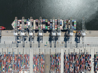 Container shipping terminal in the port harbour. import export and loading and unloading of...