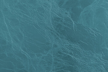Dark blue leather texture background The concept of artificial leather used for making bags, pad and various appliances.