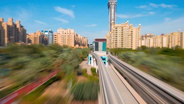 Dubai / UAE-TimeLapse video of  Palm Jumeirah island viewed from Monorail train in high speed hyperlapse video.