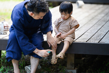 Parents and children wearing insect repellent