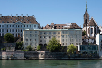 Martin's Church ('Martinskirche') with stately university buildings and museums on the banks of the Rhine in the Swiss city of Basel. Cityscape