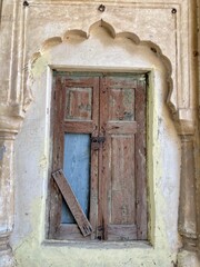old iron lock on the gate, an old wooden door in India