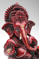 Lord ganesha sculpture on white background.