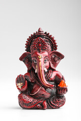 Lord ganesha sculpture on white background.