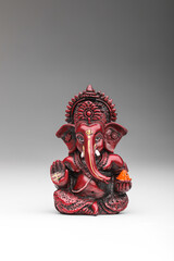 Lord ganesha sculpture on white background.