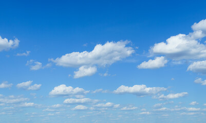 Naklejka na ściany i meble beautiful blue sky with clouds on bright sunny day for abstract background