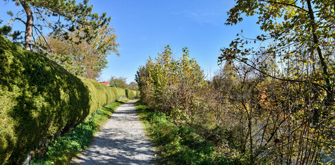 Fototapeta na wymiar bike and walkway along Loisach river, Wolfratshausen