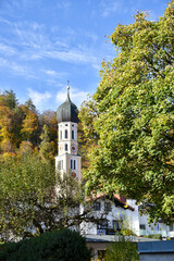 St. Andreas church Wolfratshausen in autumn landscape