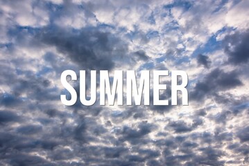 SUMMER - word on the background of the sky with clouds.