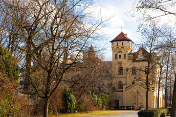 Historical buildings in Hessing Park in Augsburg under blue sky
