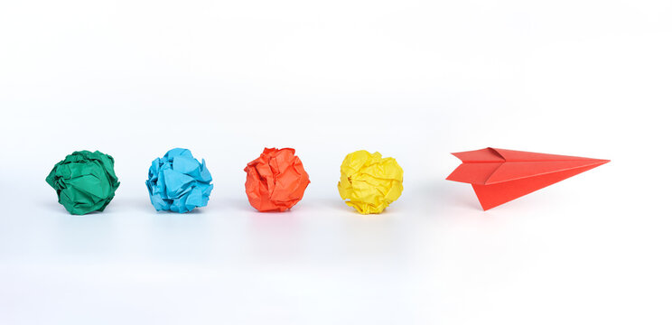 Creative idea. Concept of idea, innovation and Inspiration with Red paper plane and crumpled paper on white background