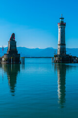 Germany, Lindau city port lighthouse and beautiful view to austria and bregenz alsp mountains...