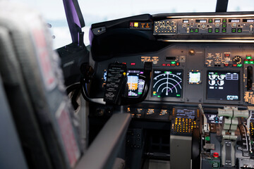 Nobody in plane jet cockpit with electronic dashboard control, engine throttle to fly aircraft. No people in aviation cabin with radar compass navigation lever and panel command handle.