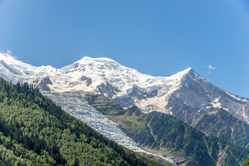 View at the massif of Mont Blanc mountains with Glacier from Chamonix town - France