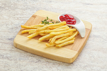 French fried potato over board