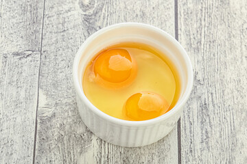 Chicken egg in the bowl