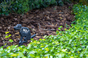 No dog pooping sign