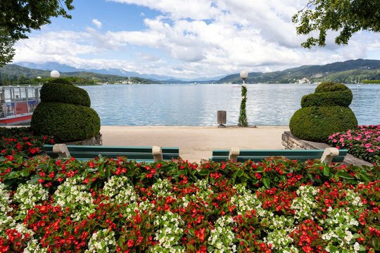 Bench to relax in front of Lake Woerthersee in Carinthia, Austria