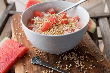 Breakfast bowl  with puffed quinoa, yogurt and watermelon