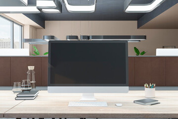 Close up of creative wooden designer desktop with empty black mock up computer monitor and supplies in modern coworking office with partition. 3D Rendering.