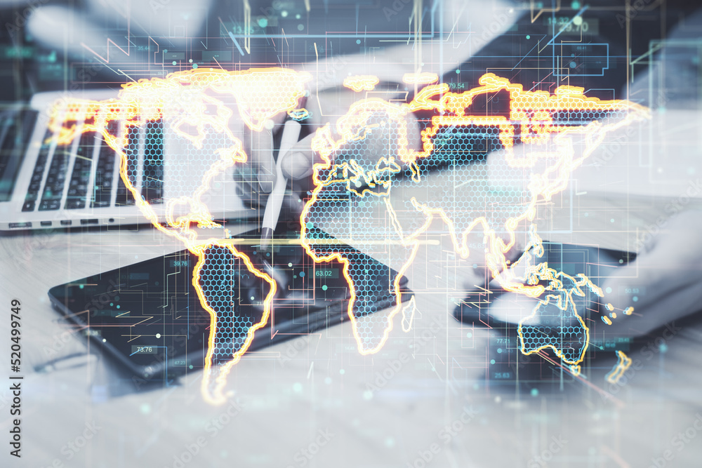 Poster close up of businessman hands using tablet with digital pad on desktop with abstract glowing golden 