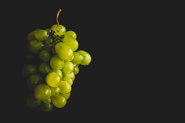 Green Grapes, on black backround
