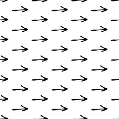 Seamless pattern with black hand drawn arrows