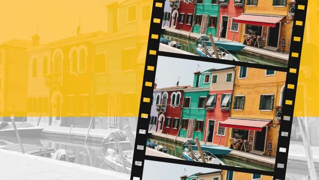 Burano, Venice, Italy - July 2, 2022: Modern photographic film with  brightly colored houses and water canal with boats in Burano, people walk and rest on streets