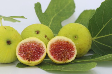 Halved and whole fig fruits 