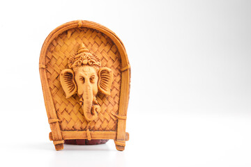 Lord ganesha face on plastic sup on white background.