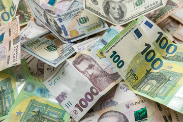 Obraz na płótnie Canvas Ukrainian UAH currency exchange on dollars on euros close up