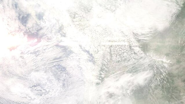 Earth zoom in from outer space to city. Zooming on Port Coquitlam, Canada. The animation continues by zoom out through clouds and atmosphere into space. Images from NASA