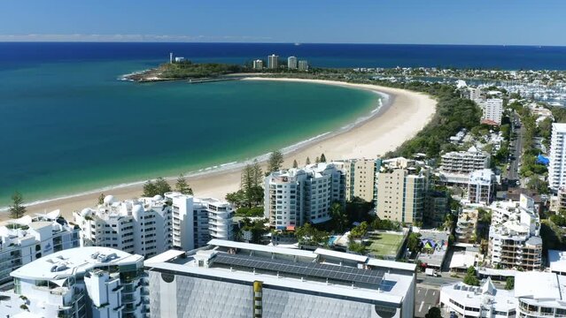 Aerial 4K Drone View Over Beach Front Apartments And Rooftops With Ocean Views In Australia