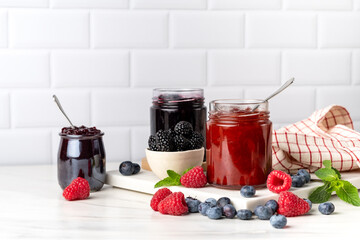 Homemade berry jam in glass jar . preserves for winter