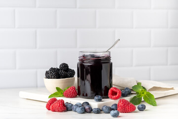 Homemade berry jam in glass jar . preserves for winter