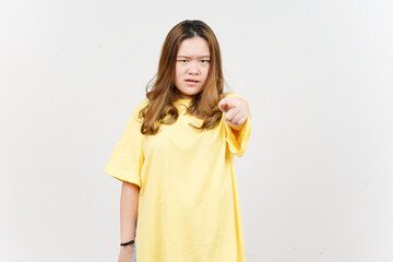 Angry expression and Pointing at camera of Beautiful Asian Woman wearing yellow T-Shirt