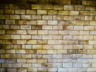 Brown beige brick wall grunge textured backdrop background  - stock photo