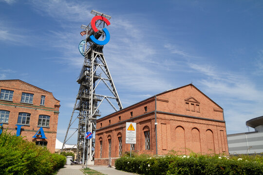 Silesia City Center shopping mall, located on the site of former coal mine KWK Gottwald. SCC logo sign at antique tower shaft Jerzy on July 21, 2022 in Katowice, Poland.