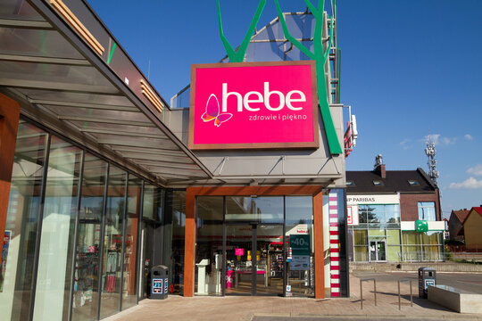 Hebe cosmetics store with company logo sign board hanging above entrance door. Health and beauty perfumery and drug pharmacy chain shop signboard with logotype on June 5, 2022 in Mielec, Poland.