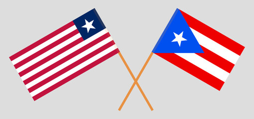 Crossed flags of Liberia and Puerto Rico. Official colors. Correct proportion.