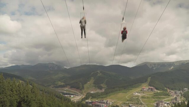 Descent on a zipline in the mountains