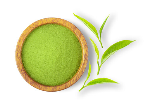powdered matcha green tea in bowl isolated on white background. top view